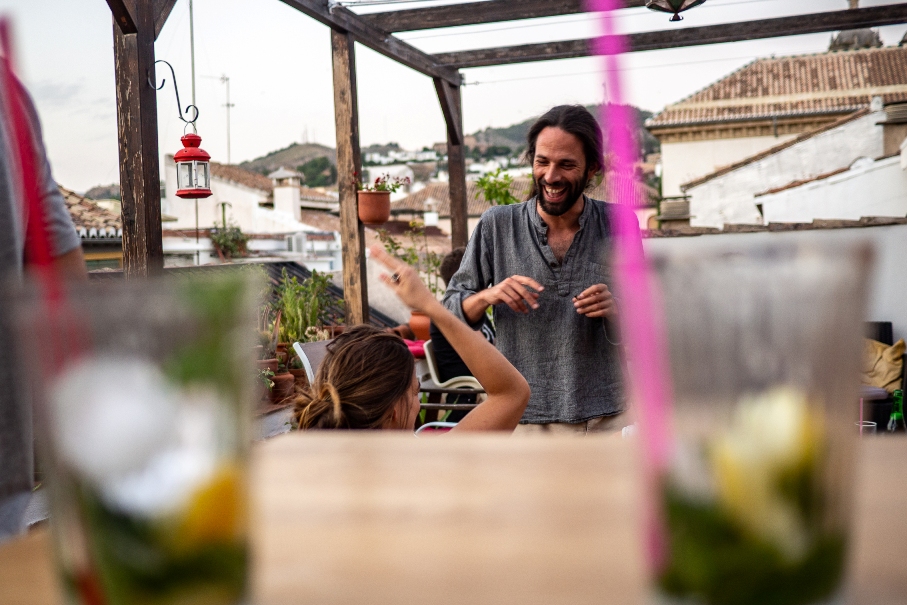 OLYMPUS DIGITAL CAMERA Guests socializing on rooftop terrace